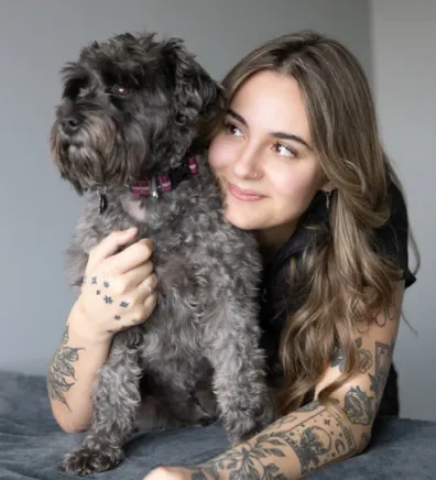Jocelyn with a fluffy brown dog